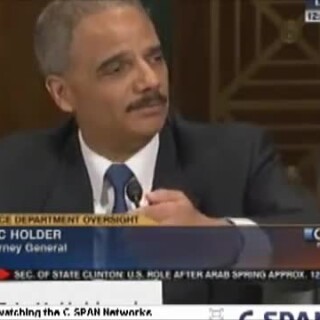 Eric-Holder-Choking-on-his-Testimony