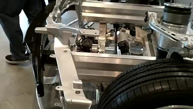 Tesla-S..-Battery-pack-and-drivetrain-close-up-walk-around-view.mp4